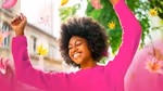 Woman smiling in pink
