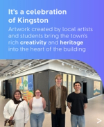 Four local students stand smiling in a modern gallery space featuring colourful local artwork on the walls.